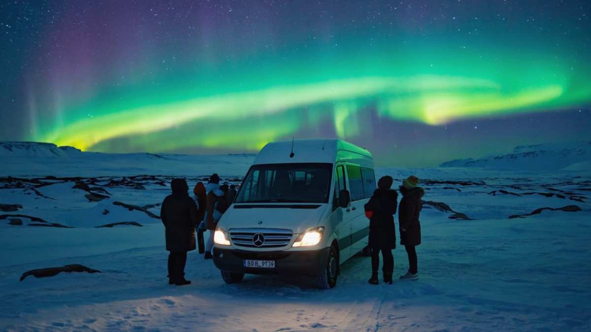 People watching the auroras right outside their camper rental